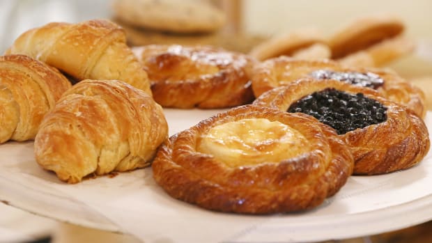 Fresh baked croissants, cheese danish, blueberry danish raspberry danish and an apple danish rest on a platter at Awaken Bake Company in Hudson.  
